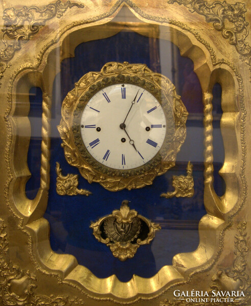 Gilded wall clock, built in frame