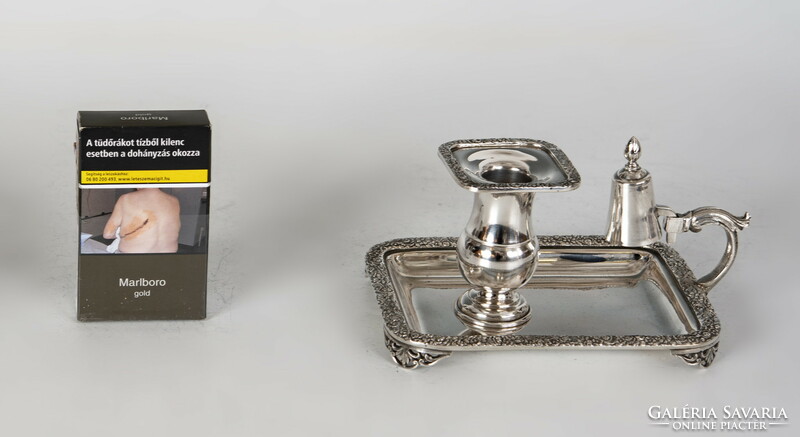 Silver manual candle holder with tap