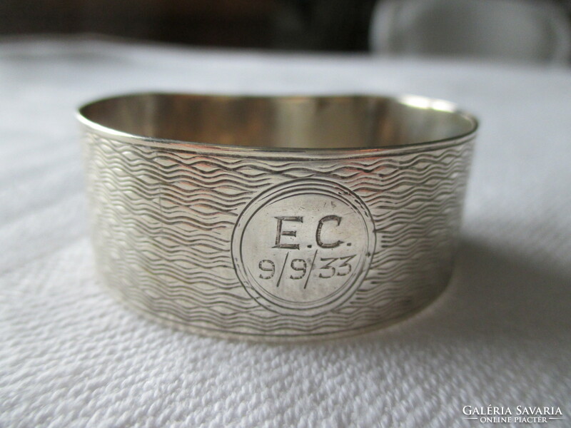 Antique silver napkin ring with lion British hallmark, master mark, engraved decoration