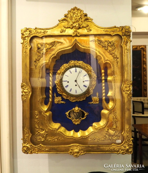 Gilded wall clock, built in frame