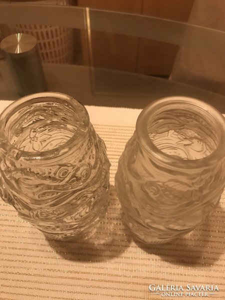 A pair of glass vases with a sea pattern