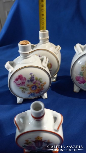Collection of porcelain water bottles with floral, folk and fruity motifs. They are marked Zsolnay, Kőbányai
