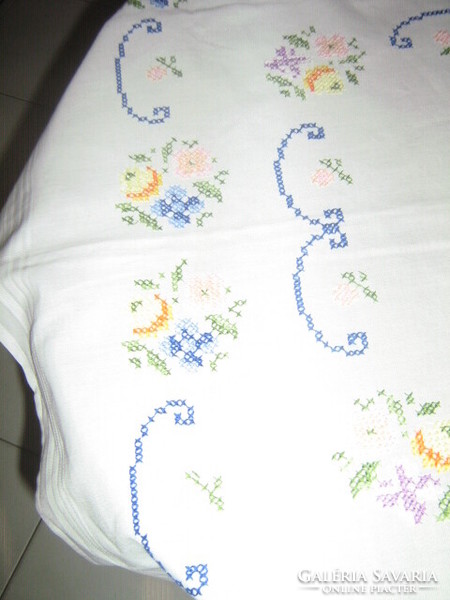 Beautiful floral tablecloth embroidered with small cross stitch