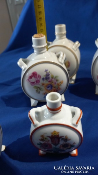 Collection of porcelain water bottles with floral, folk and fruity motifs. They are marked Zsolnay, Kőbányai