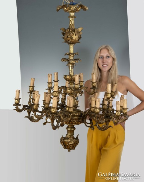 Gilded bronze 18-arm chandelier - with faun heads