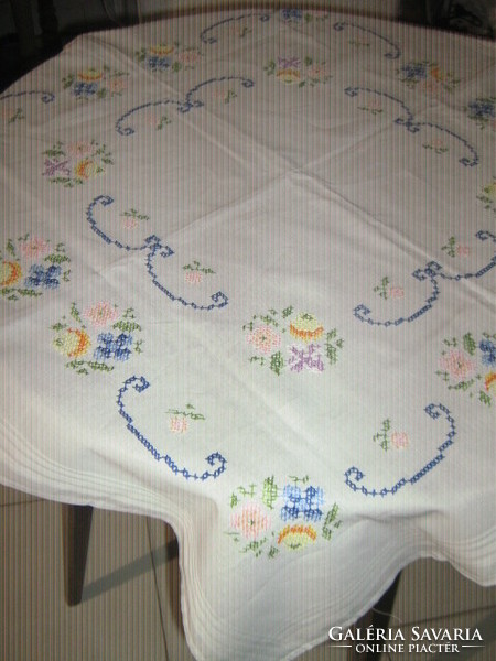 Beautiful floral tablecloth embroidered with small cross stitch