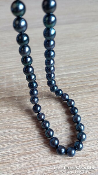 Blue saltwater cultured pearl string with gold fittings