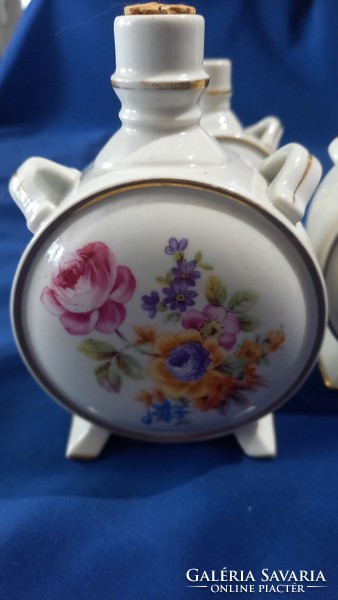 Collection of porcelain water bottles with floral, folk and fruity motifs. They are marked Zsolnay, Kőbányai