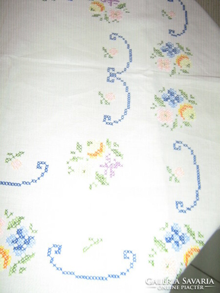 Beautiful floral tablecloth embroidered with small cross stitch