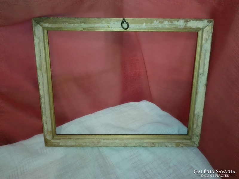 Old gilded wooden picture frame.