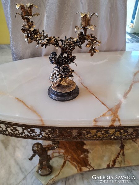 Unique silver candle holder decorated with gilded flowers!