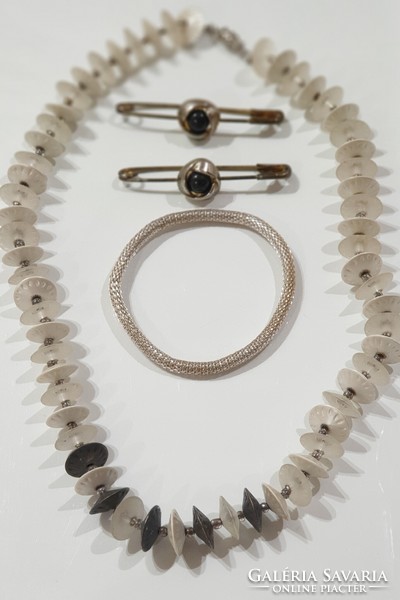 Old necklace, bracelet, badge