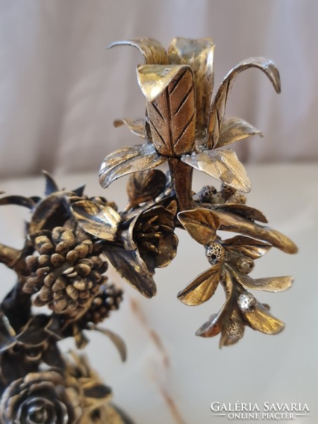Unique silver candle holder decorated with gilded flowers!
