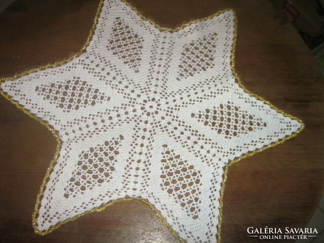 Beautiful white antique hand-crocheted star-shaped tablecloth with aany edges
