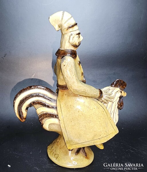 Kosiarska - ceramic figure riding a rooster