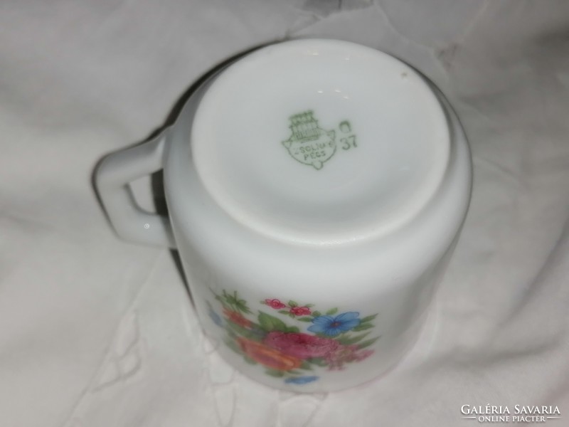 A rare Zsolnay coffee cup with a bouquet of spring flowers