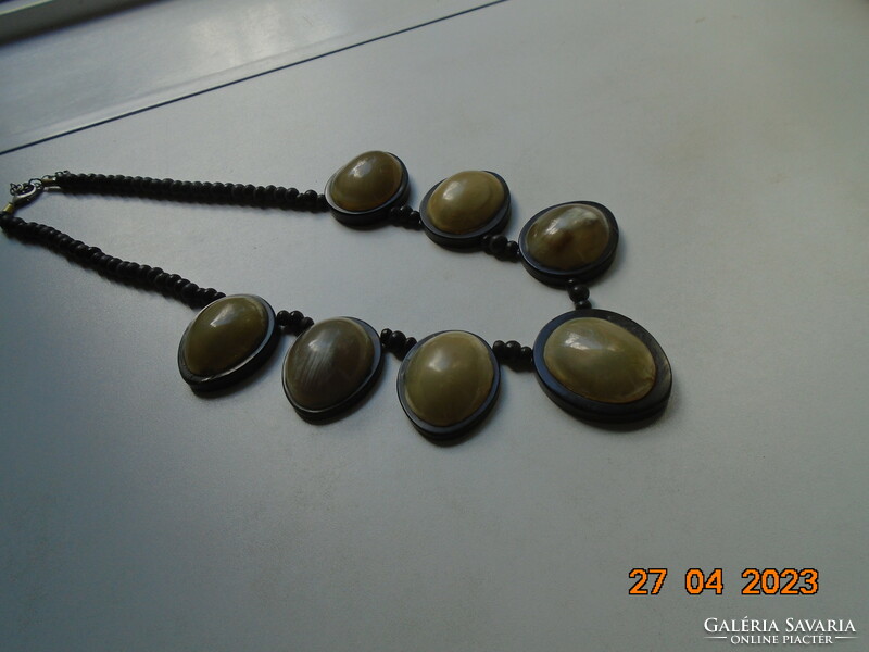 Boho vintage of 7 large horn pendants in a wooden socket, necklace with exotic wooden beads