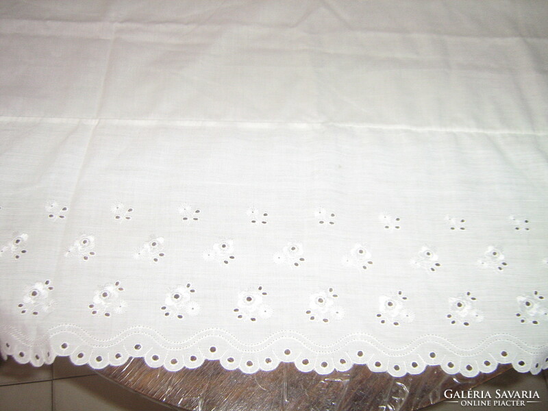 White madeira lace stained glass curtain with a filigree flower pattern