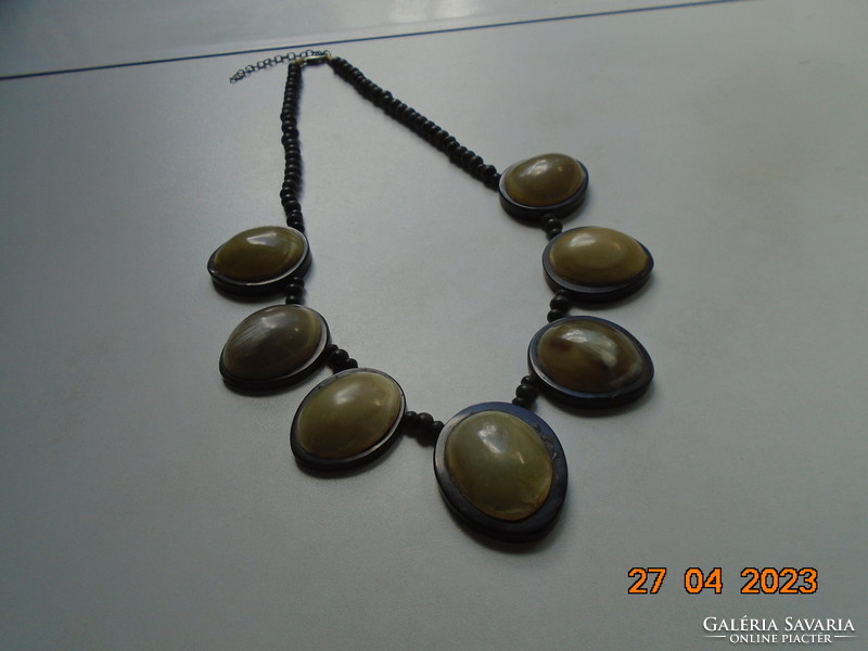 Boho vintage of 7 large horn pendants in a wooden socket, necklace with exotic wooden beads