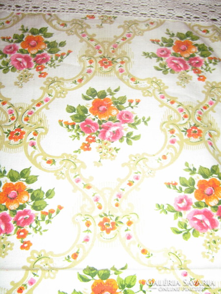 A cute baroque rose pattern tablecloth with a lace edge