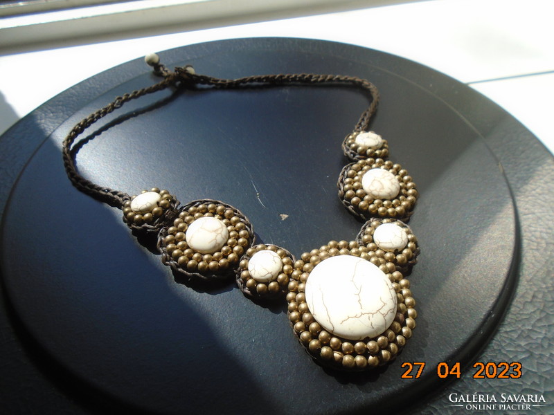 Nepalese tribal leather cord braided necklace with 7 howlite discs and gold pearl pendants