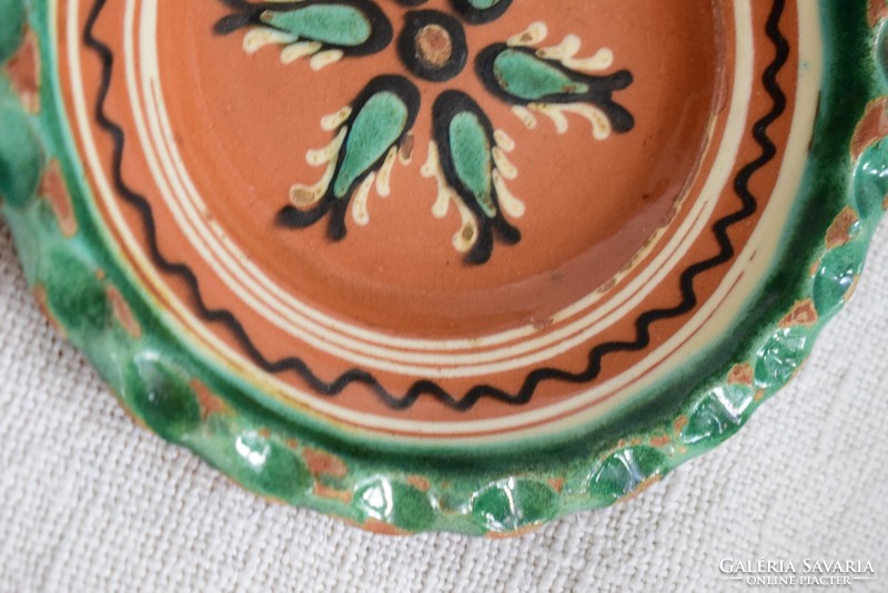 Painted glazed folk ethnographic ceramic wall plate, 17.5 x 3 cm, junior tailor