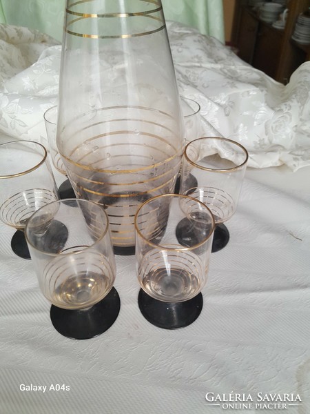 Set of black stemmed glasses with gold trim