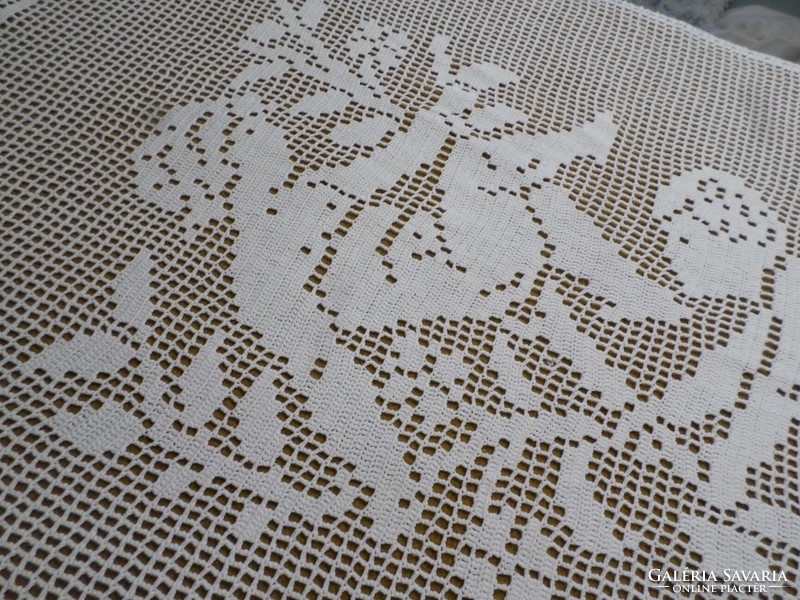 White crochet lace angel curtain.