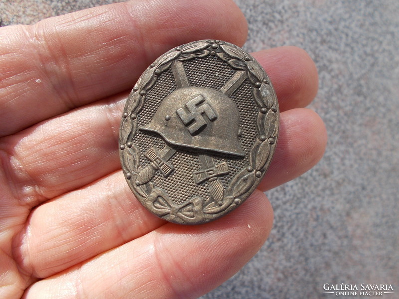 Ww2, German wounded badge bronze grade, original original, marked 65.