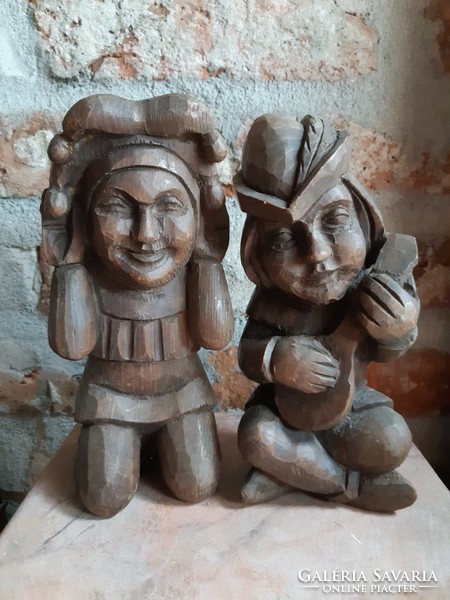 An interesting pair of wooden sculptures