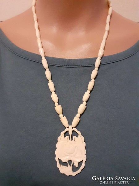 Carved bone necklace with matching bangle