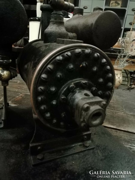 Steam engine boiler, metal boiler, part of an illustrative device, made of iron, a serious solid piece from the beginning of the 20th century