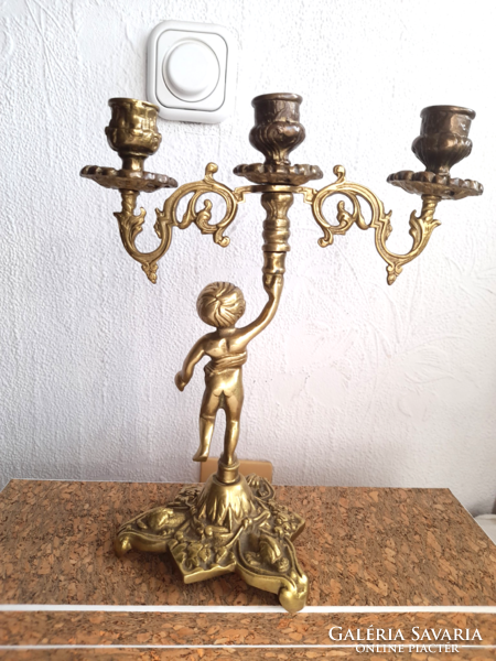 Old copper putto candle holder