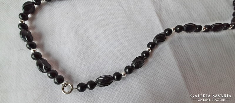 Retro black string of beads, with silver spacers