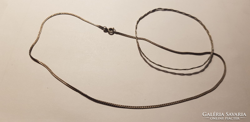 Flat necklace and twisted bracelet are old pieces