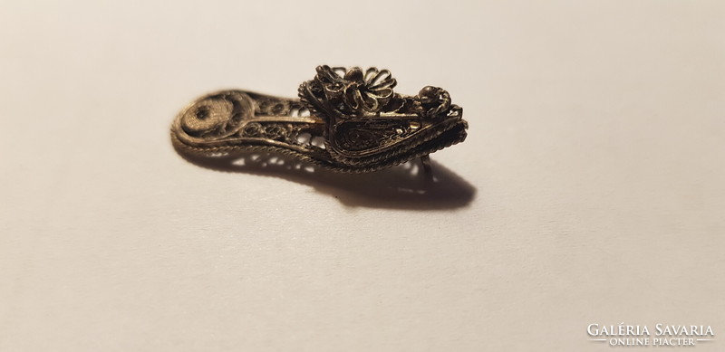 Filigree slipper pendant is an old piece