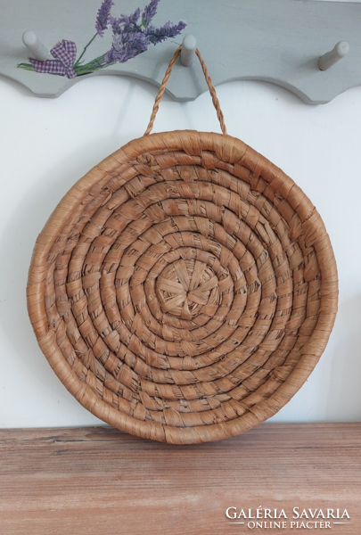 Retro, vintage wicker wall decoration bread basket, possibly a serving tray