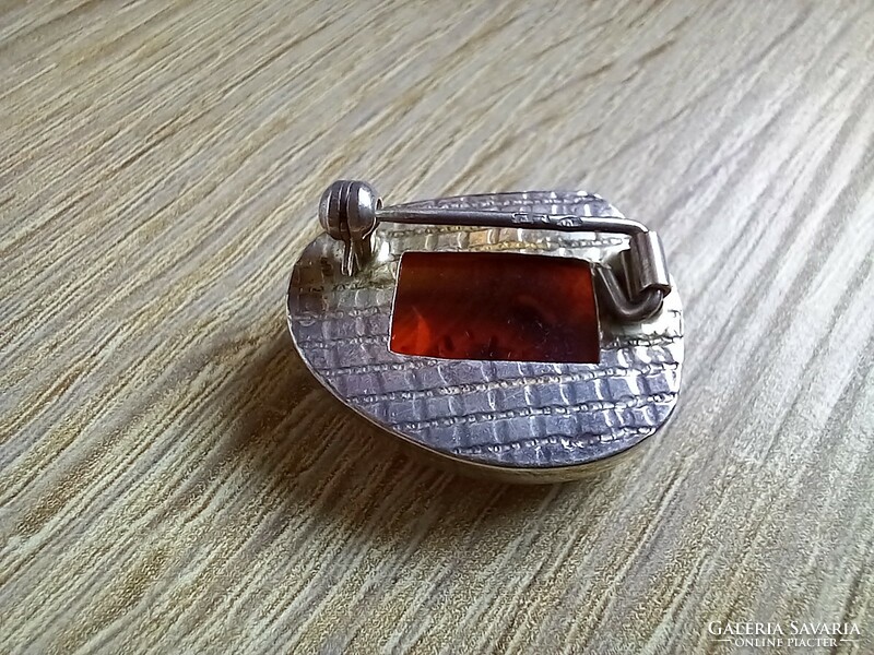 Art deco silver brooch with amber stone