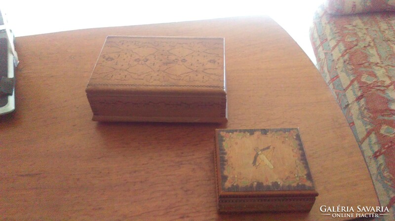 Old cigarette cases in wooden boxes