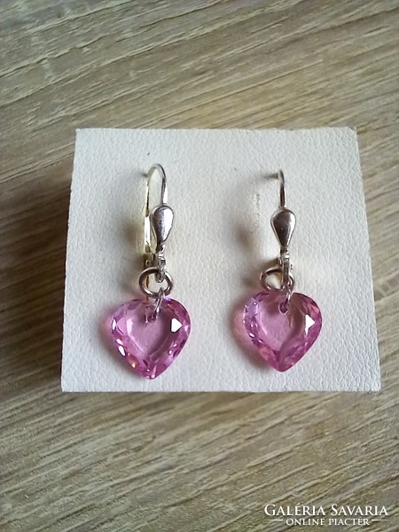 Silver earrings with a pink heart-shaped stone