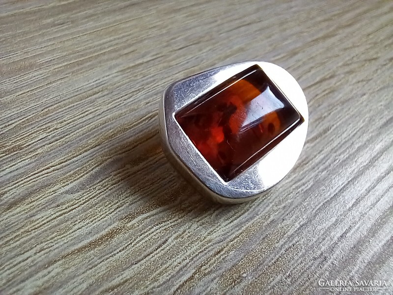 Art deco silver brooch with amber stone