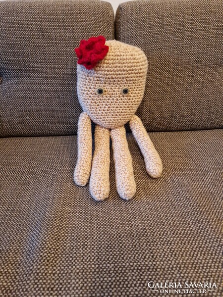 Cream colored knitted octopus baby