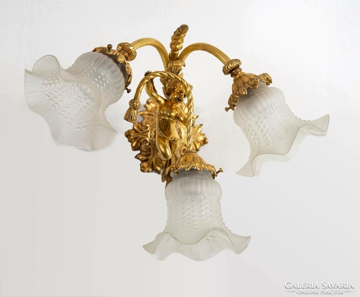 Pair of gilded bronze wall arms - with an angel figure