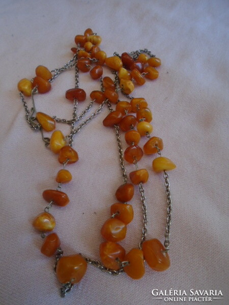 A handful of lemon yellow 100% natural amber necklaces can be used in 2 rows