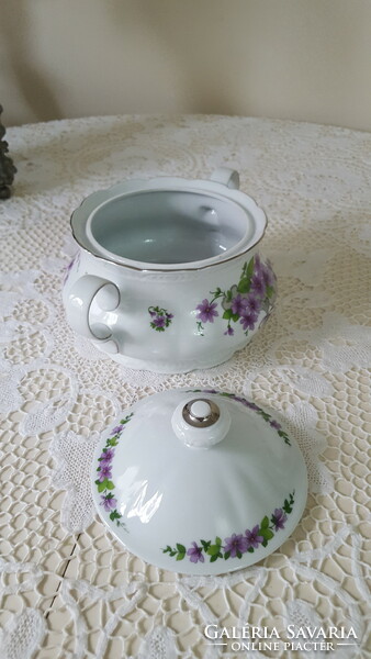 A beautiful side dish and soup bowl with a violet lid