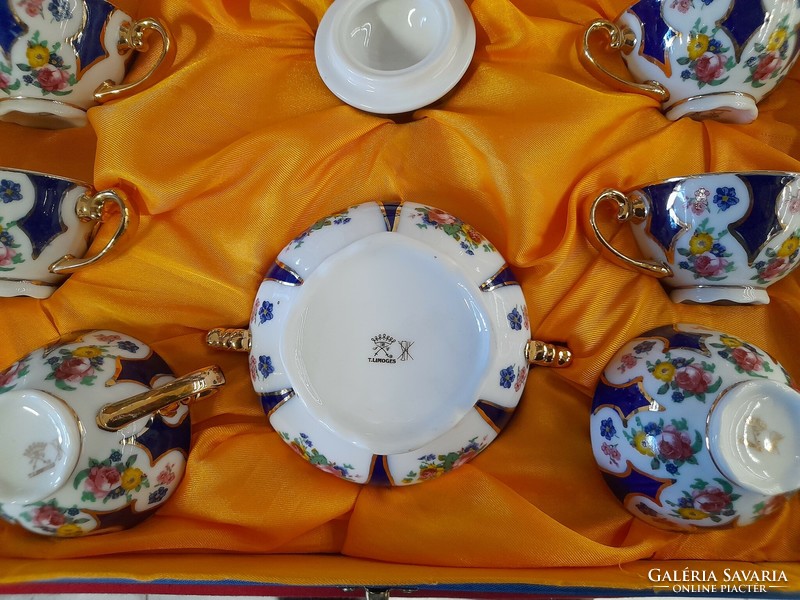 Exclusive French Limoges hand-painted, gilded 6-person porcelain coffee and tea cup set.