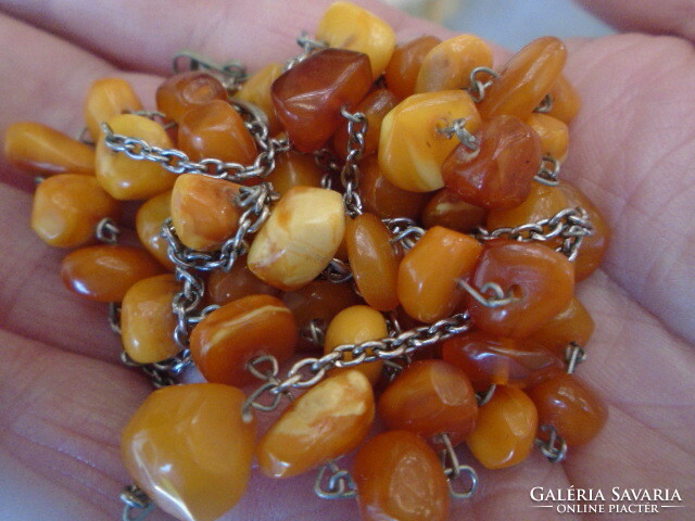 A handful of lemon yellow 100% natural amber necklaces can be used in 2 rows