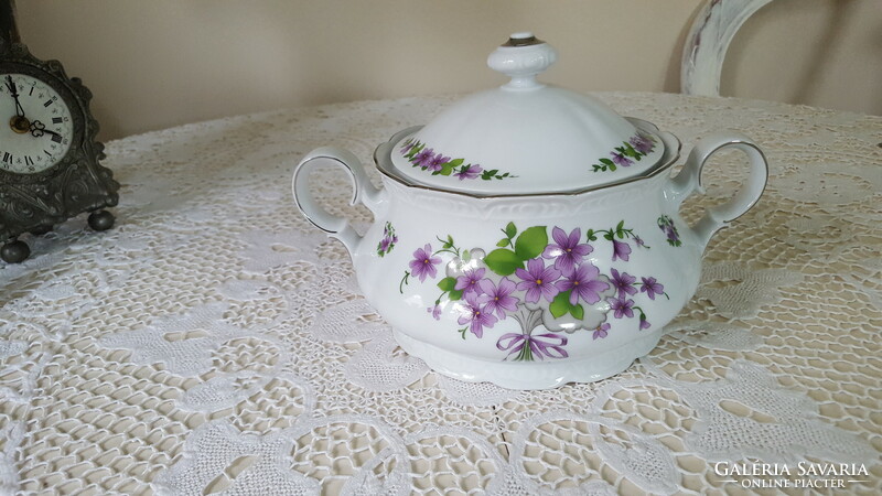 A beautiful side dish and soup bowl with a violet lid