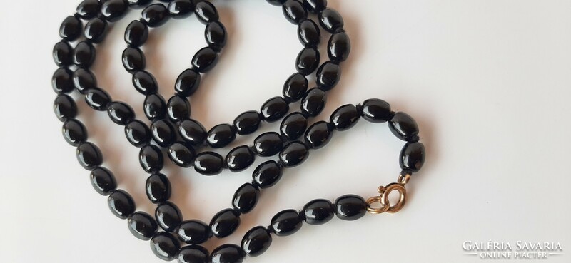Vintage black glass beads with gold plated clasp
