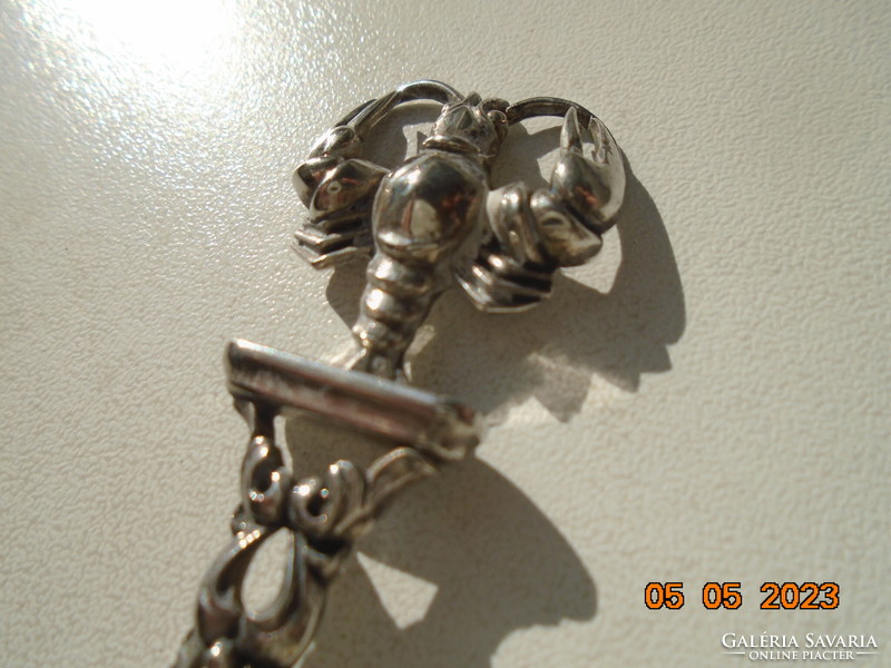 Unique goldsmith's figural miniature crab star sign on a silver decorative spoon